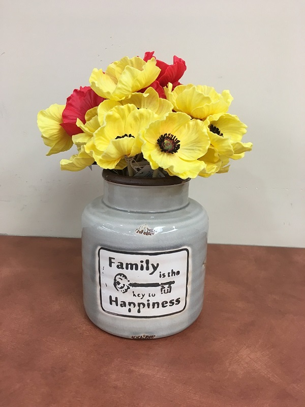 Family vase with red and yellow poppies