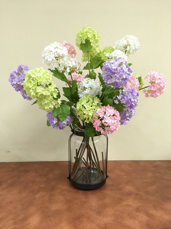 Glass vase with hydrangeas